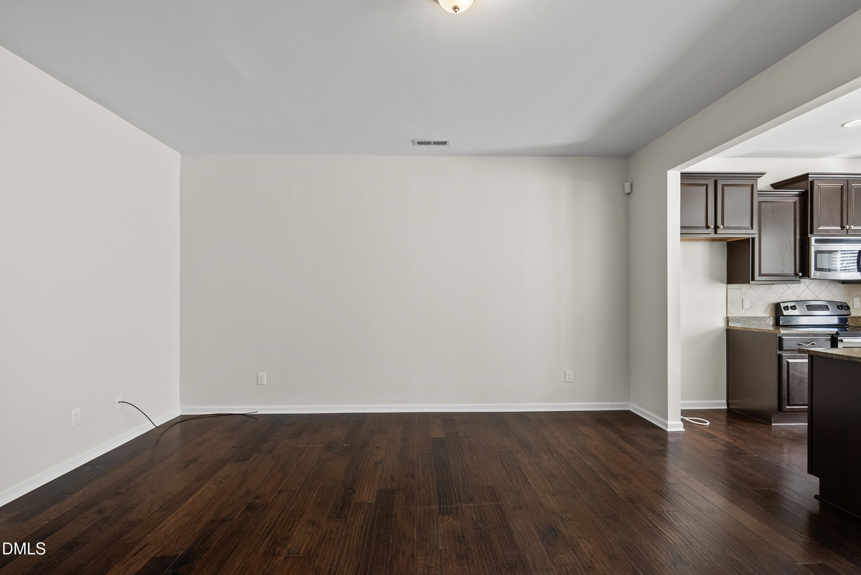 309 Leighann Ridge Lane Rolesville, NC 27571 - Photo 17 of 25 a view of a kitchen with a sink and a refrigerator