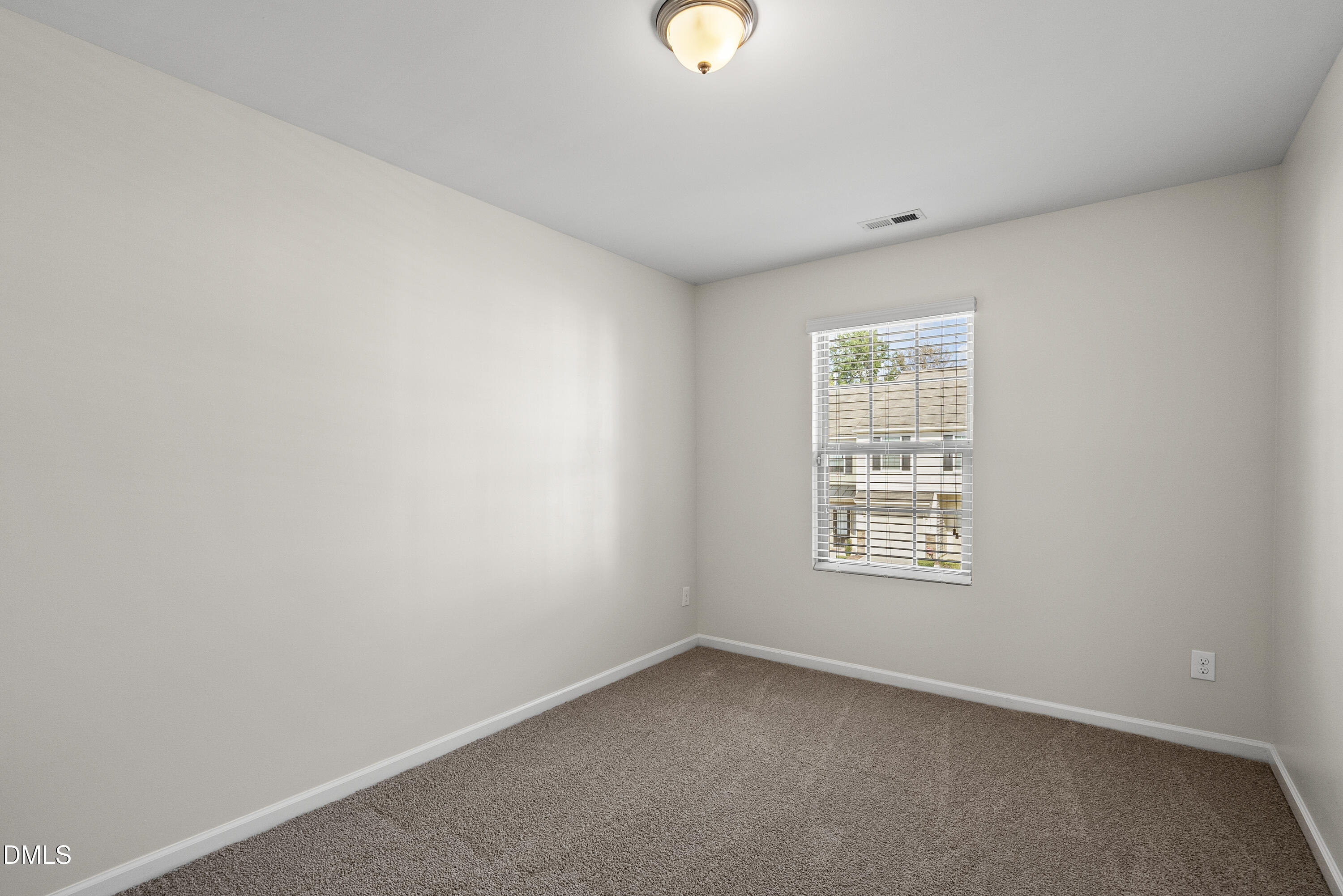 309 Leighann Ridge Lane Rolesville, NC 27571 - Photo 19 of 25 an empty room with a window