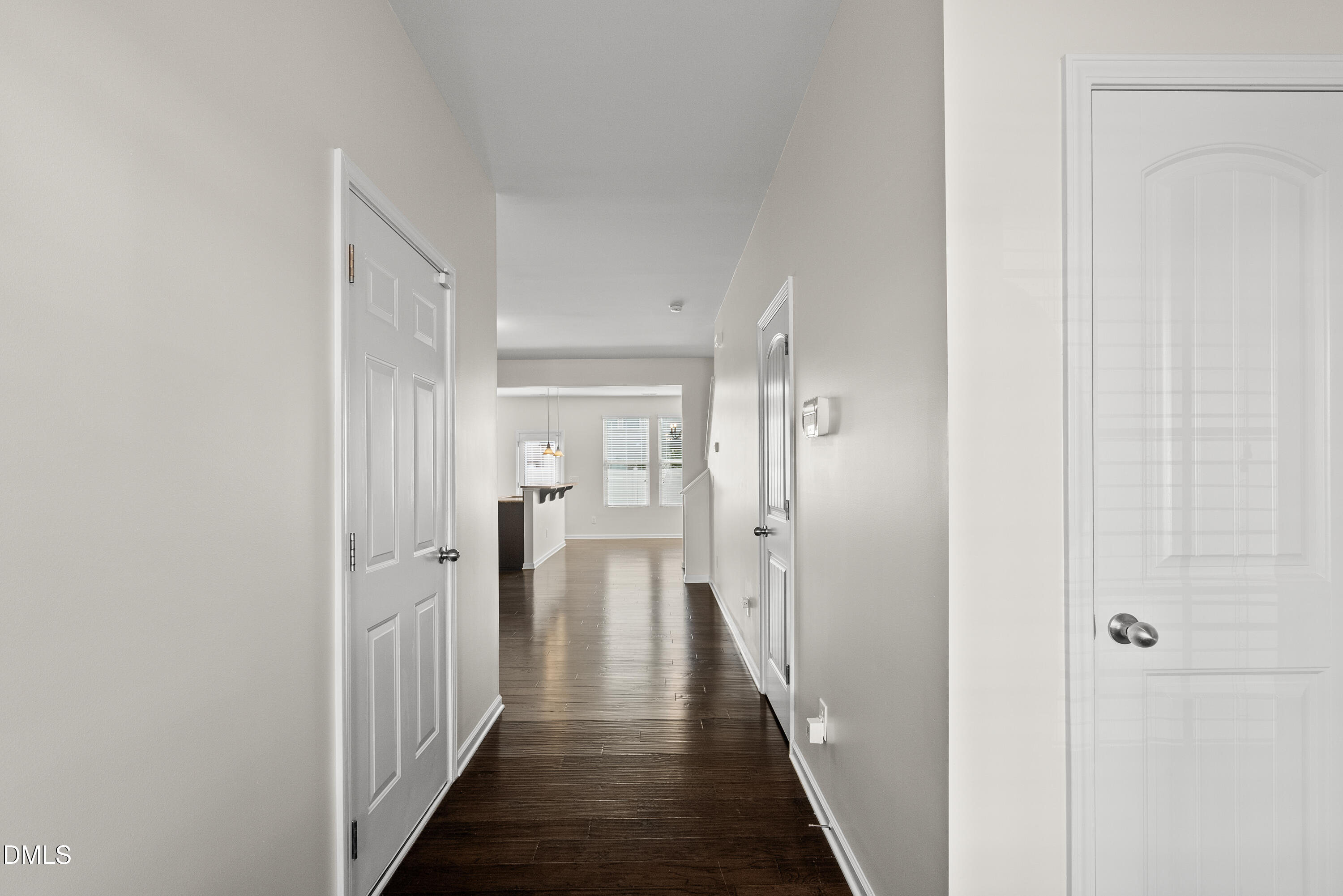 309 Leighann Ridge Lane Rolesville, NC 27571 - Photo 2 of 25 a view of a hallway with a wooden door
