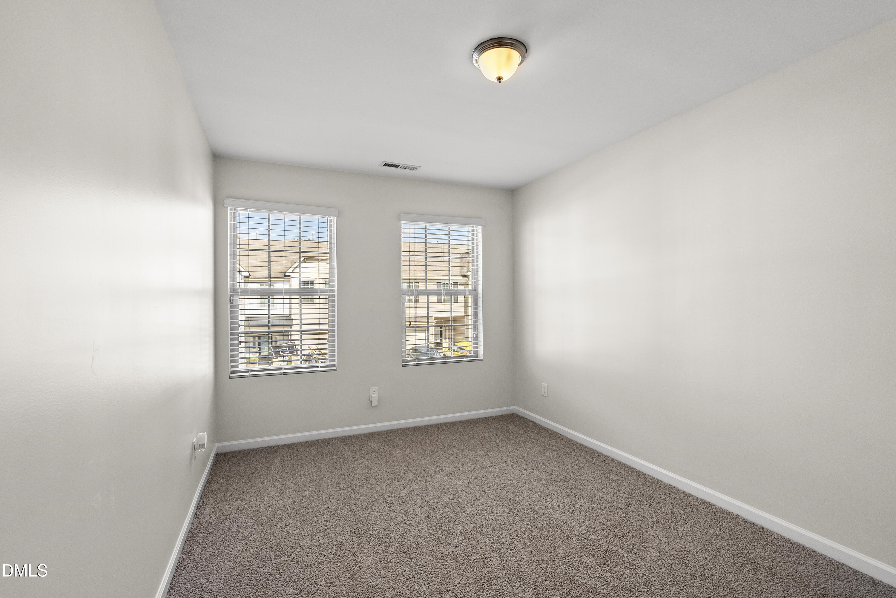 309 Leighann Ridge Lane Rolesville, NC 27571 - Photo 23 of 25 an empty room with a window