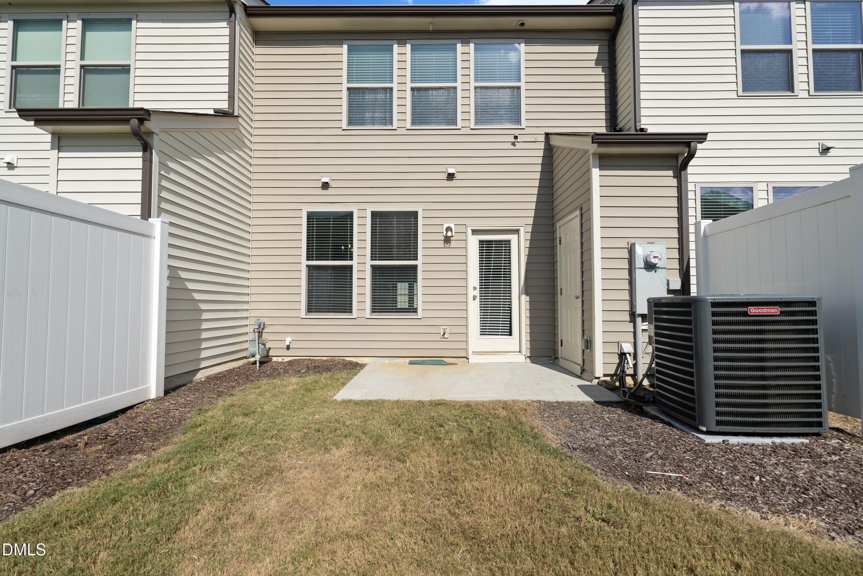 309 Leighann Ridge Lane Rolesville, NC 27571 - Photo 24 of 25 a front view of a house with a yard