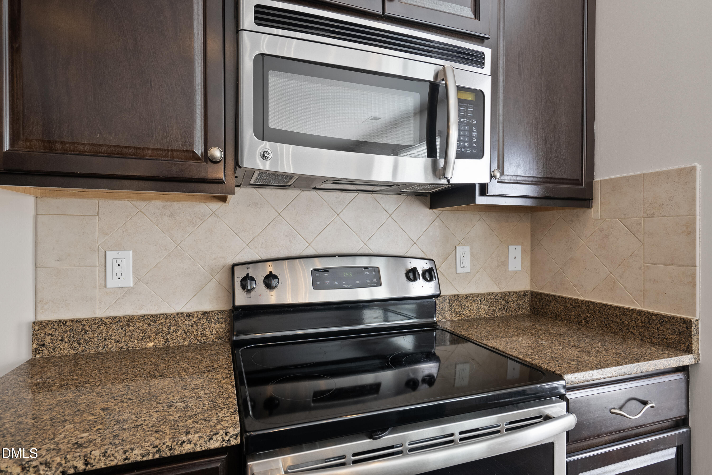 309 Leighann Ridge Lane Rolesville, NC 27571 - Photo 6 of 25 a stove top oven sitting inside of a kitchen
