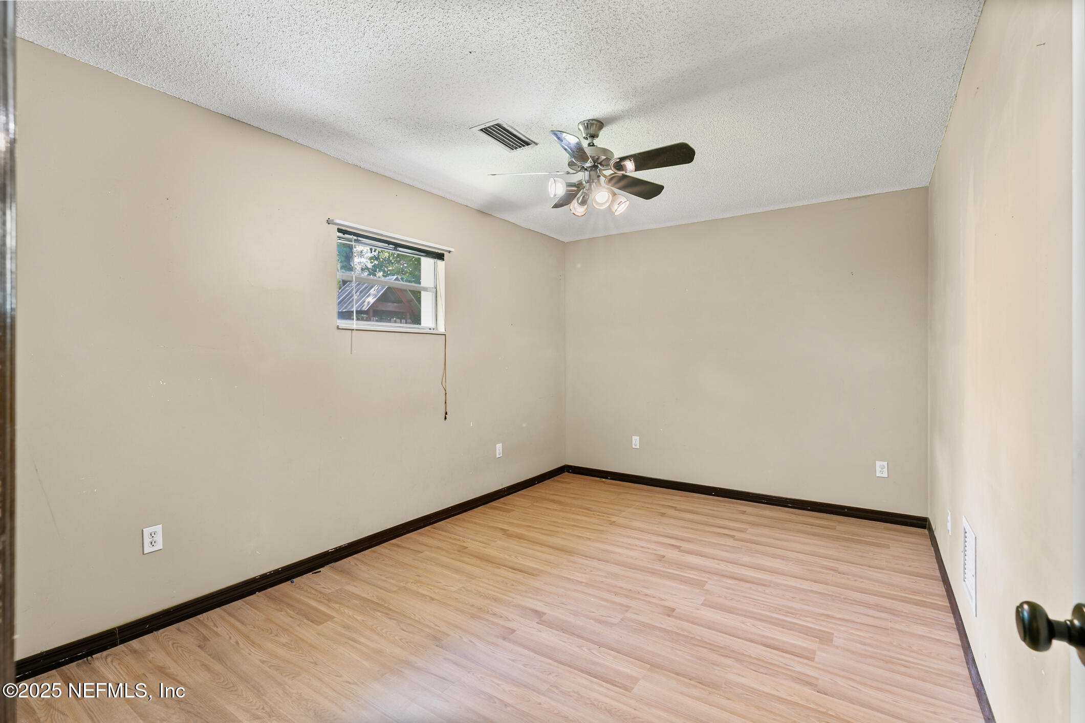 1388 Highland Boulevard St. Augustine, FL 32084 - Photo 20 of 54 a view of empty room with wooden floor