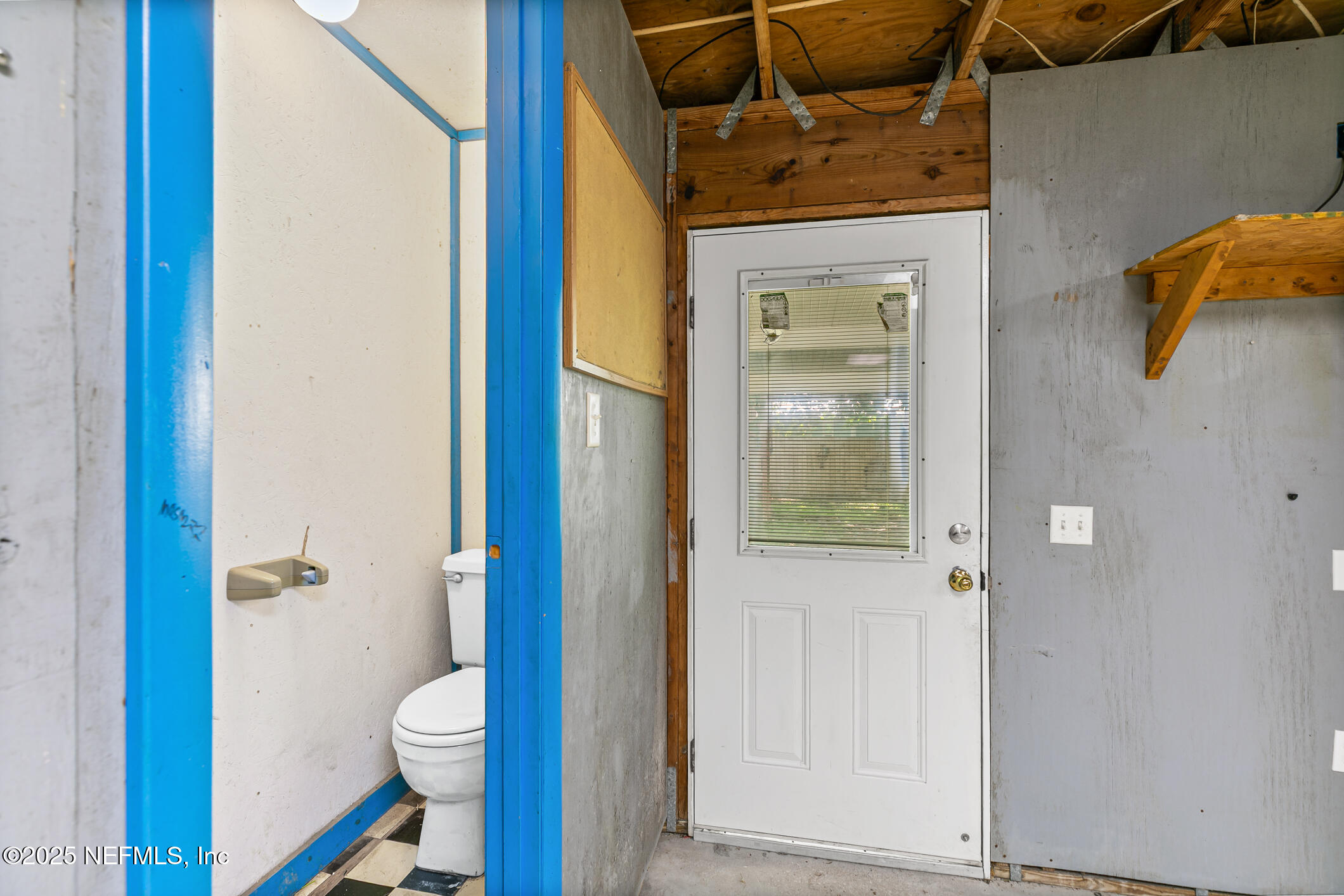 1388 Highland Boulevard St. Augustine, FL 32084 - Photo 39 of 54 a bathroom with a toilet and a shower