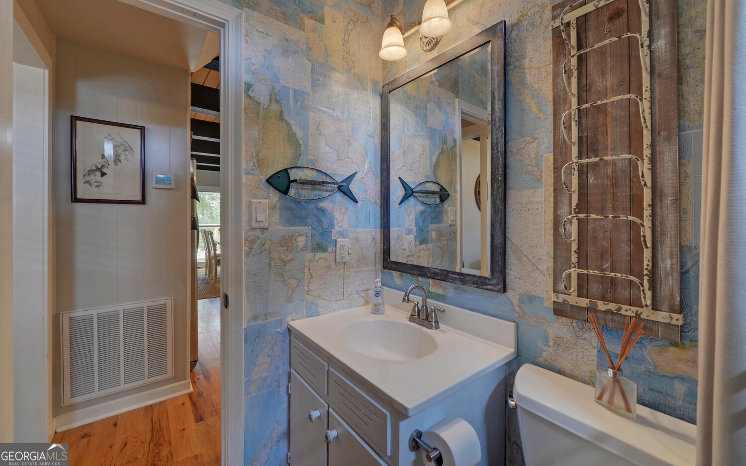 1047 Tranquility Lane Hartwell, GA 30643 - Photo 22 of 60 a bathroom with a sink toilet and shower