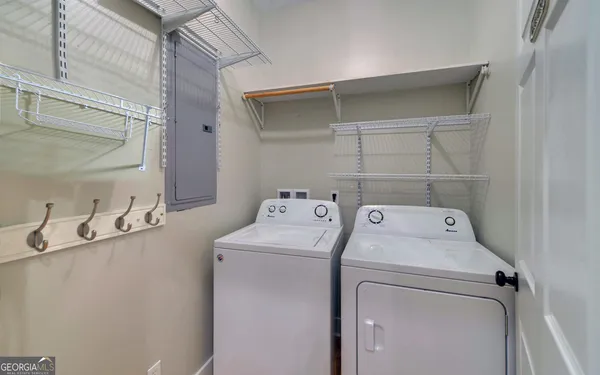 a bathroom with a sink and shower