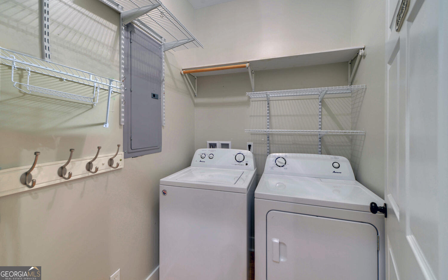 1047 Tranquility Lane Hartwell, GA 30643 - Photo 26 of 60 a utility room with dryer and washer