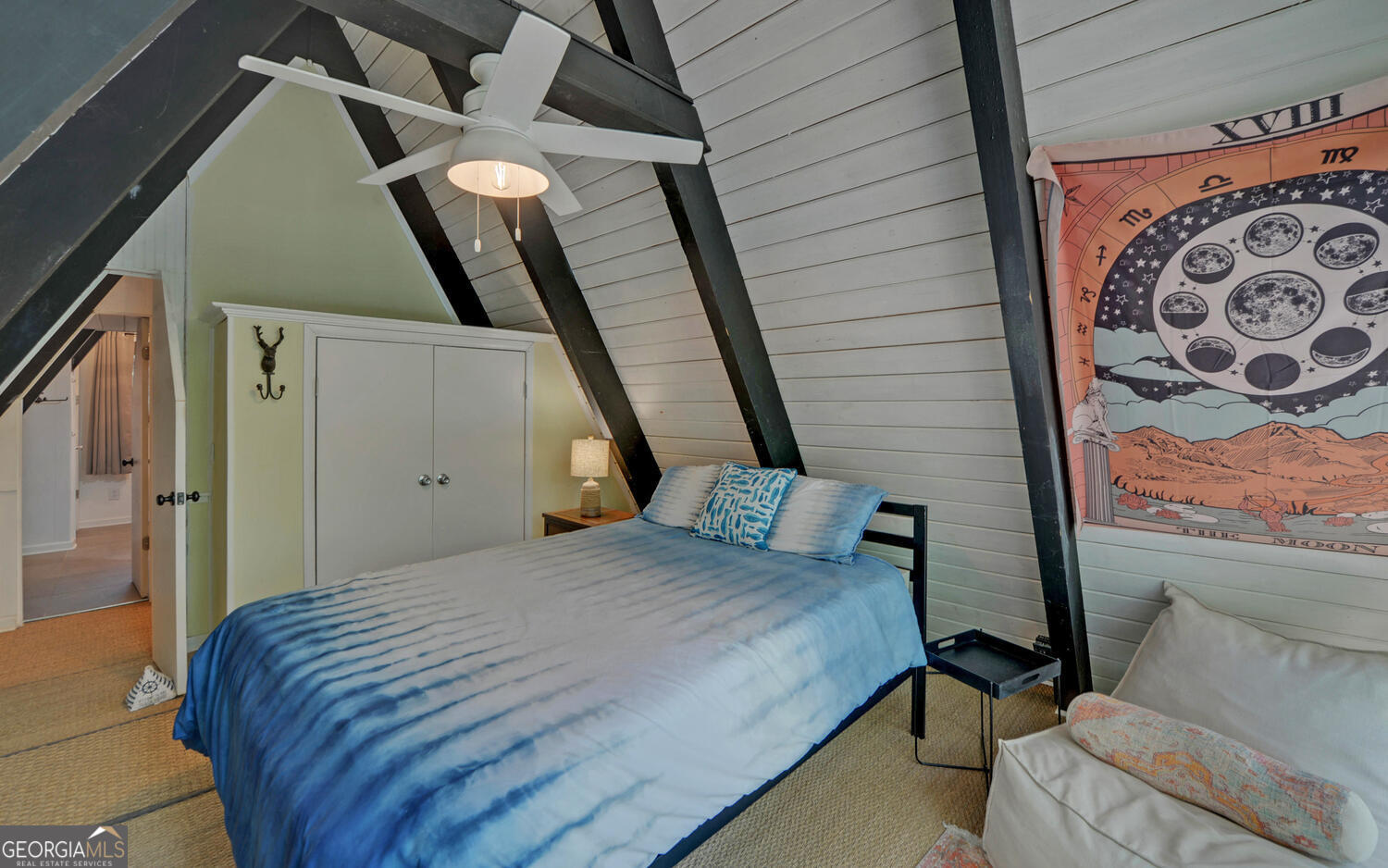 1047 Tranquility Lane Hartwell, GA 30643 - Photo 29 of 60 a bedroom with a bed and furniture