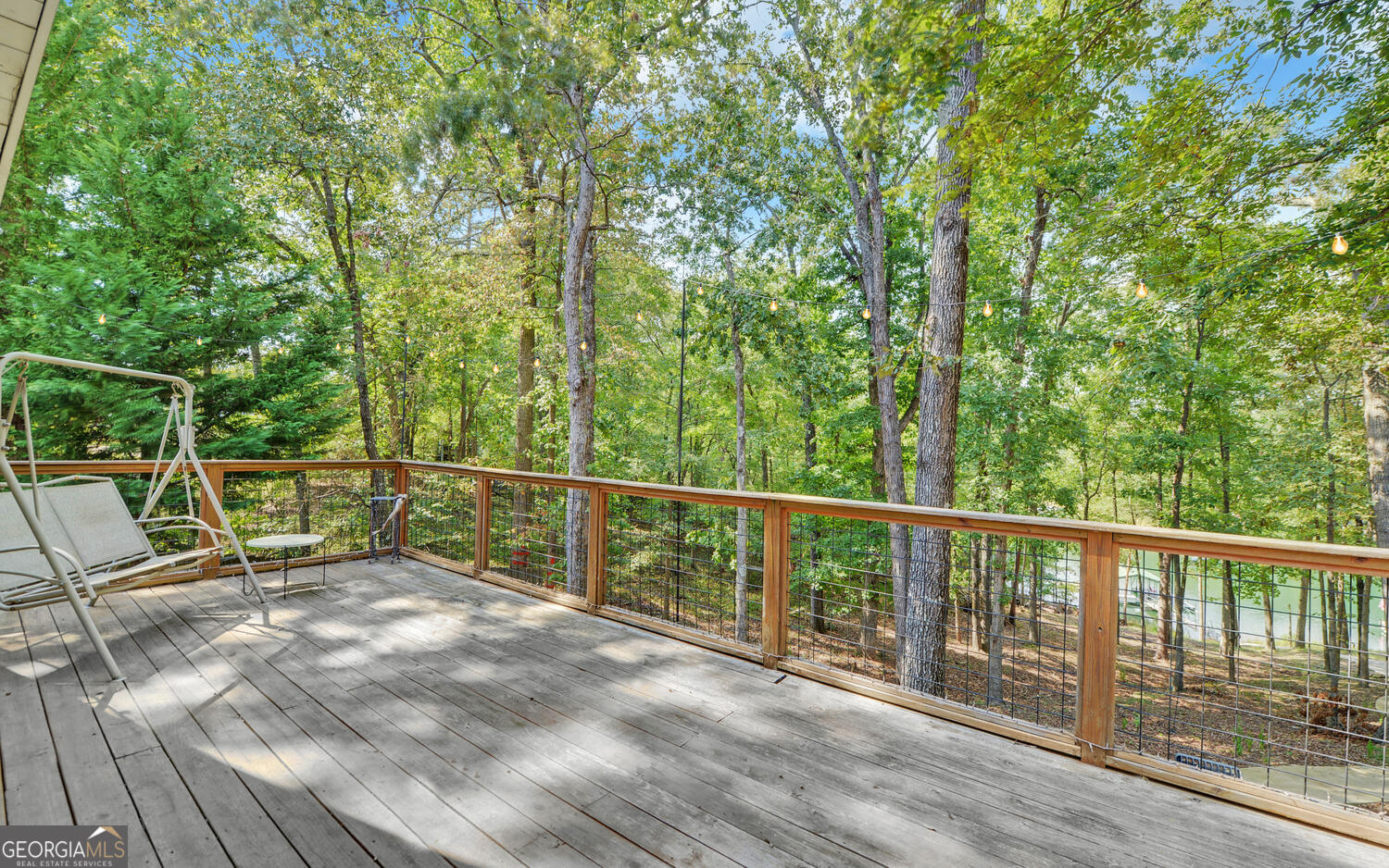 1047 Tranquility Lane Hartwell, GA 30643 - Photo 37 of 60 a view of a two chairs and table in the balcony