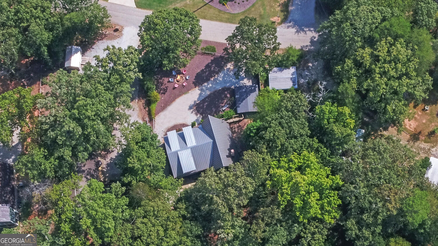 1047 Tranquility Lane Hartwell, GA 30643 - Photo 59 of 60 an aerial view of house with yard and outdoor seating