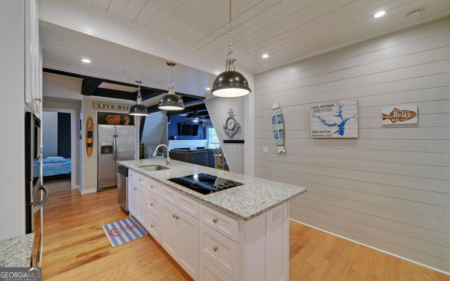 1047 Tranquility Lane Hartwell, GA 30643 - Photo 8 of 60 a kitchen that has a cabinets and a stove