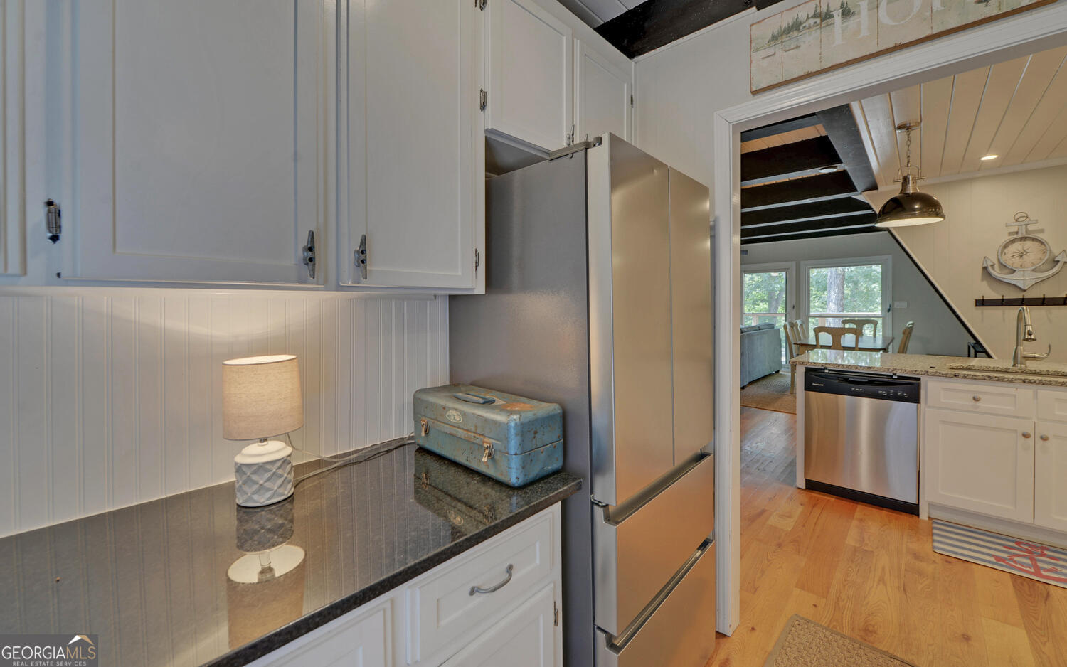 1047 Tranquility Lane Hartwell, GA 30643 - Photo 10 of 60 a kitchen with stainless steel appliances granite countertop a refrigerator and a sink