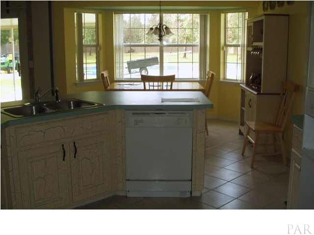 5757 Admirals Road Milton, FL 32583 - Photo 7 of 22 view of breakfast nook from kitchen