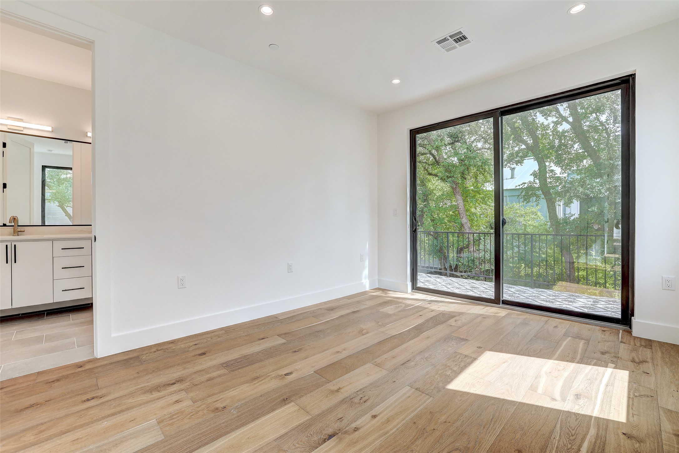 3208 Clawson Road, Unit 5A Austin, TX 78704 - Photo 24 of 34 Spare room featuring light wood finished floors and recessed lighting
