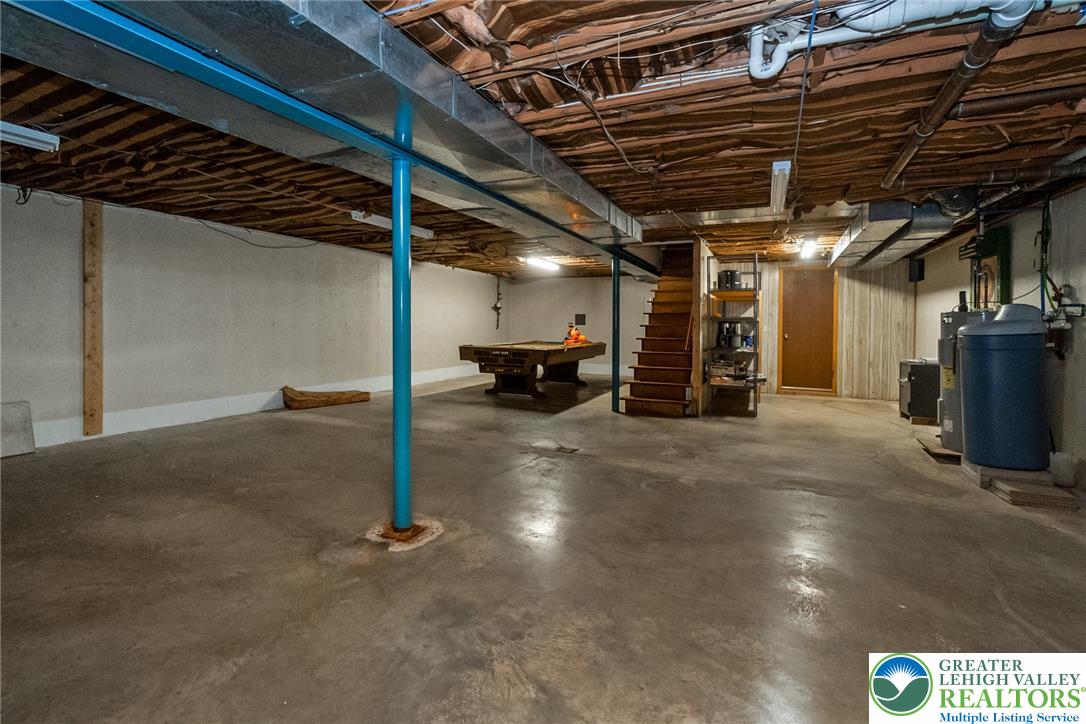 1328 Russett Road Allentown, PA 18104 - Photo 36 of 46 A spacious, unfinished basement offers endless possibilities for future customization and additional living space.