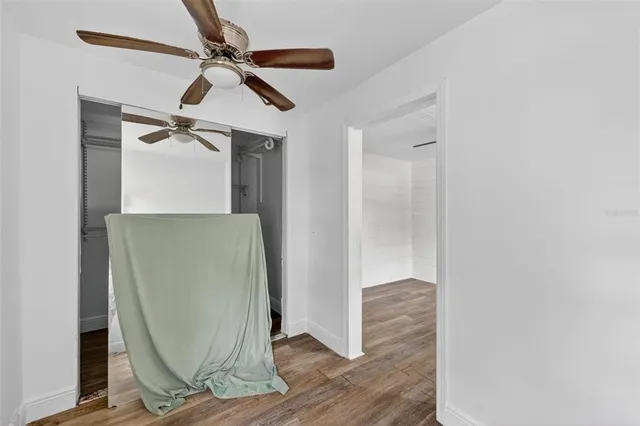 a view of entryway with wooden floor
