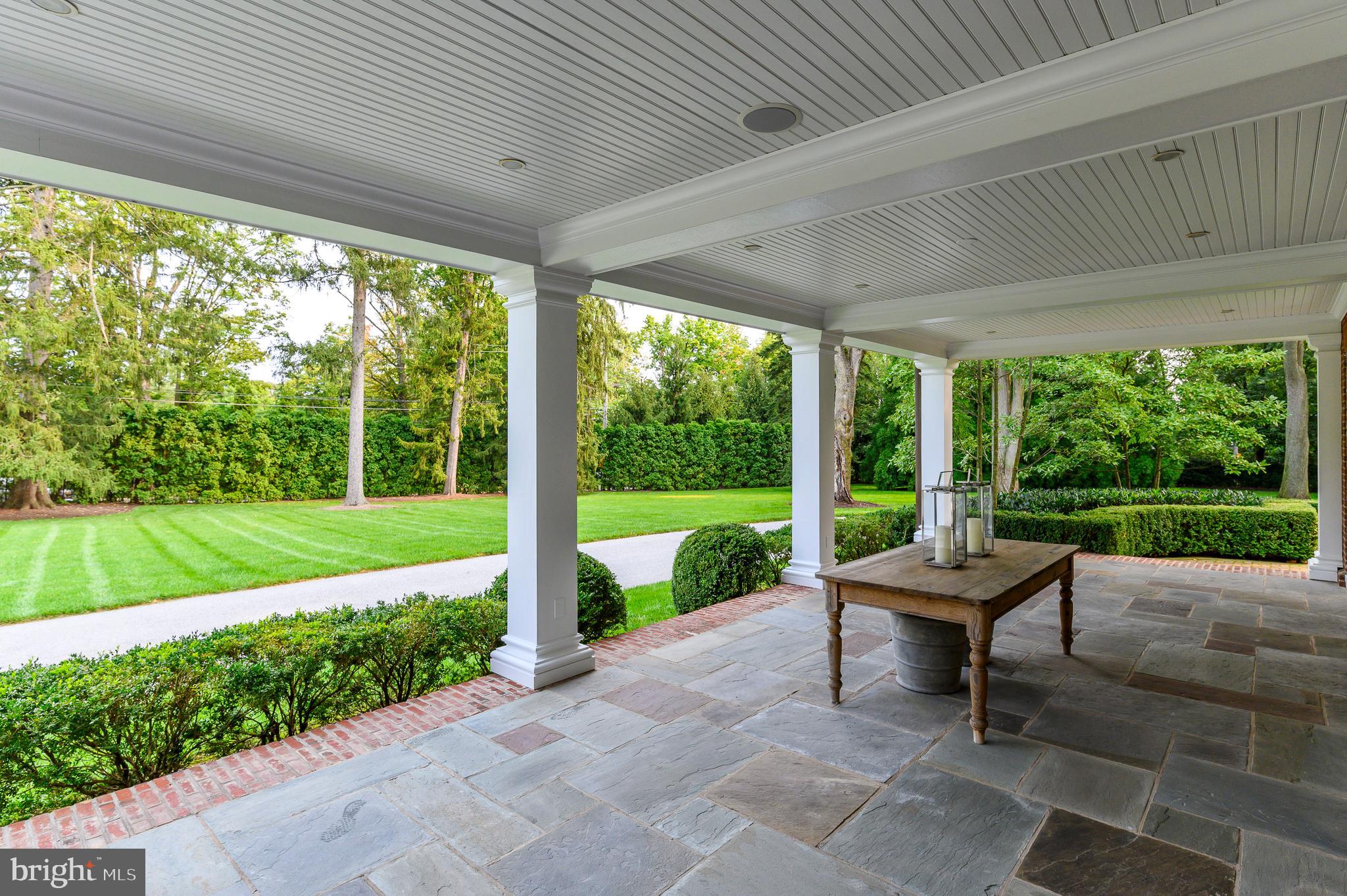 375 North Spring Mill Road Villanova, PA 19085 - Photo 7 of 72 Right flanking covered slate porch