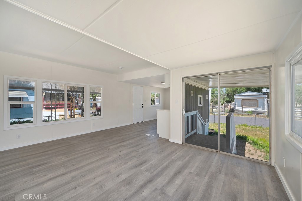 26455 Paradise Valley Road, Unit 86 Warner Springs, CA 92086 - Photo 17 of 34 wooden floor in an empty room with a window