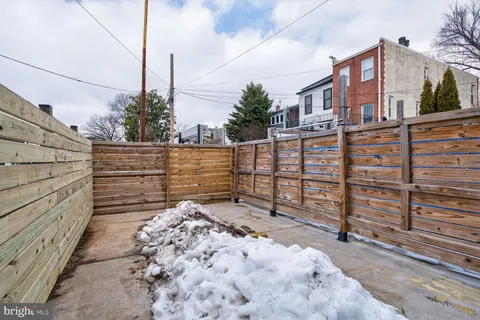a view of a balcony with a potted plant