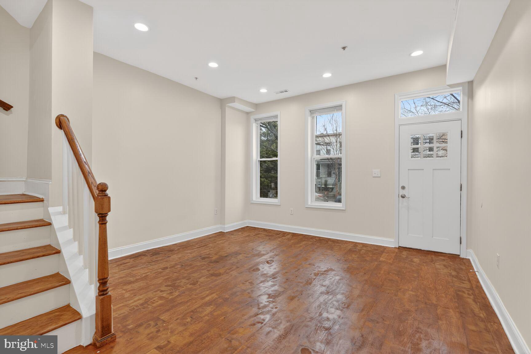 113 15th Street Southeast Washington, DC 20003 - Photo 4 of 27 a view of an empty room with a window