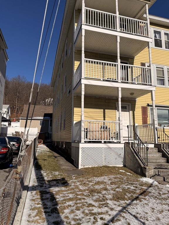1 Verdi Road Worcester, MA 01604 - Photo 2 of 11 a view of a house with a door and wooden walls