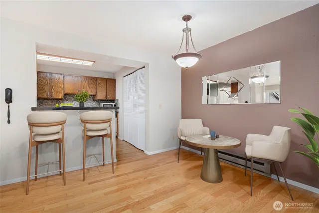 a kitchen with a sink cabinets and window