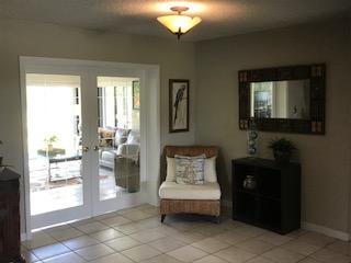 10907 Gable Street Boca Raton, FL 33428 - Photo 26 of 40 a living room with furniture and a window