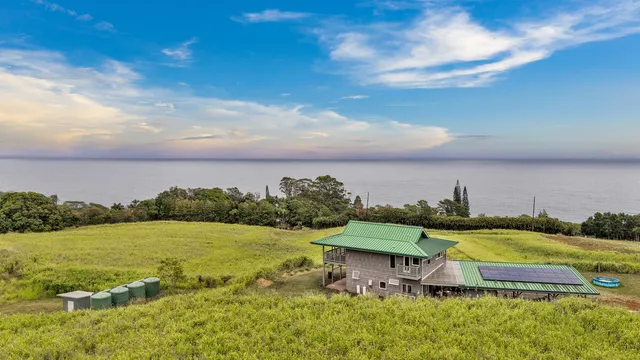 a view of a lake with a yard