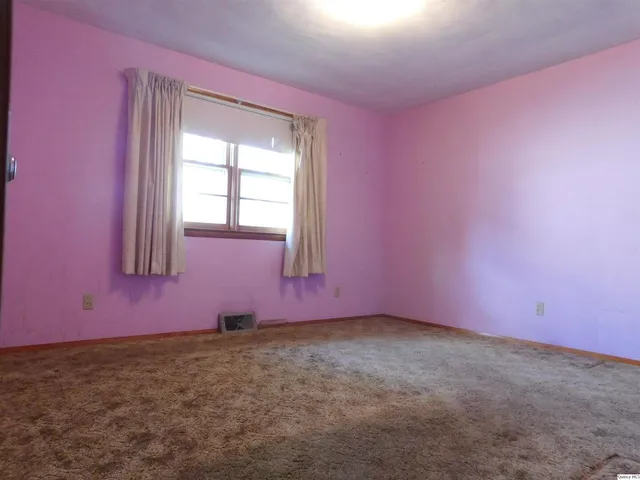 a view of empty room with window
