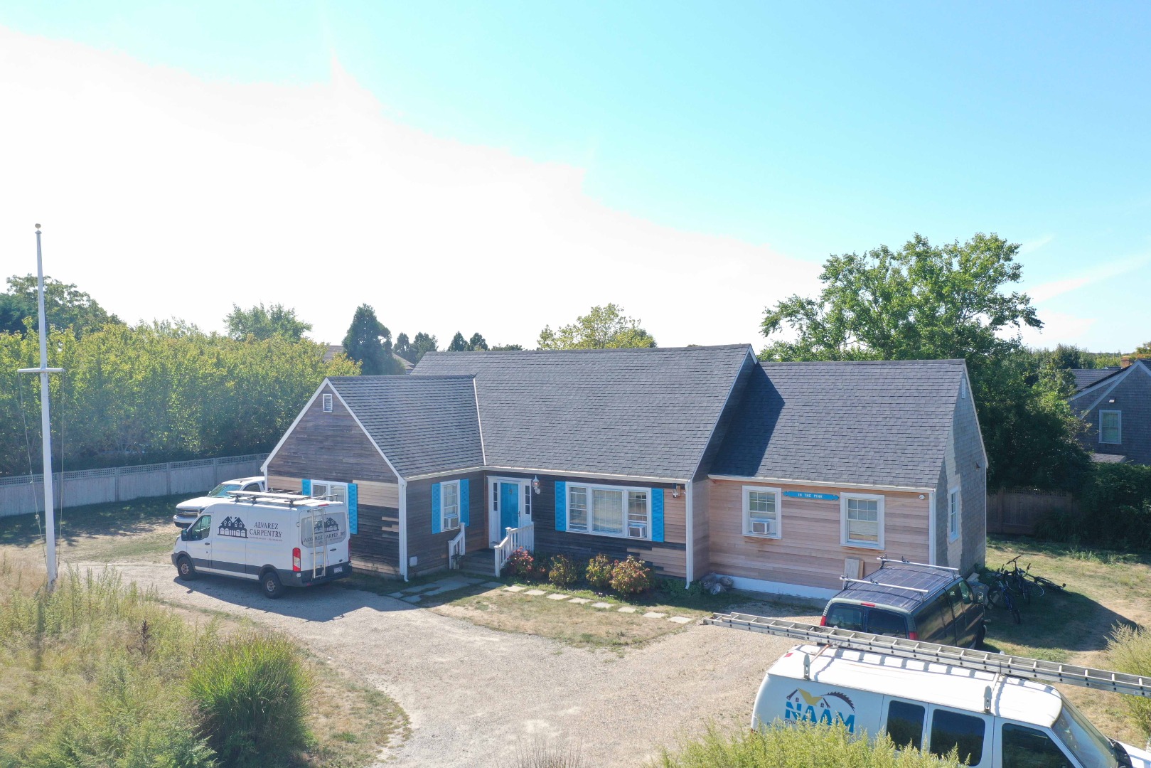 1 Pinkham Circle Nantucket, MA 02554 - Photo 1 of 12 a front view of a house with a yard