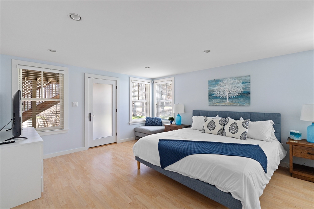 13 Young Street Edgartown, MA 02539 - Photo 16 of 29 a bedroom with a bed and a couch