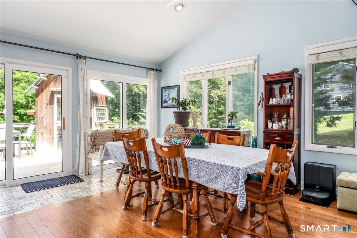 31 Aspen Mill Road Ridgefield, CT 06877 - Photo 9 of 38 Dining area opens up into Family Room and is large enough to host all the holidays