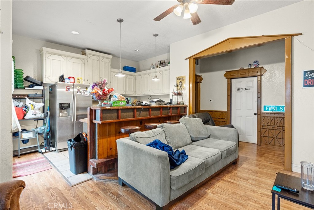 831 Rio Chico Way Chico, CA 95928 - Photo 4 of 13 a living room with furniture and a wooden floor