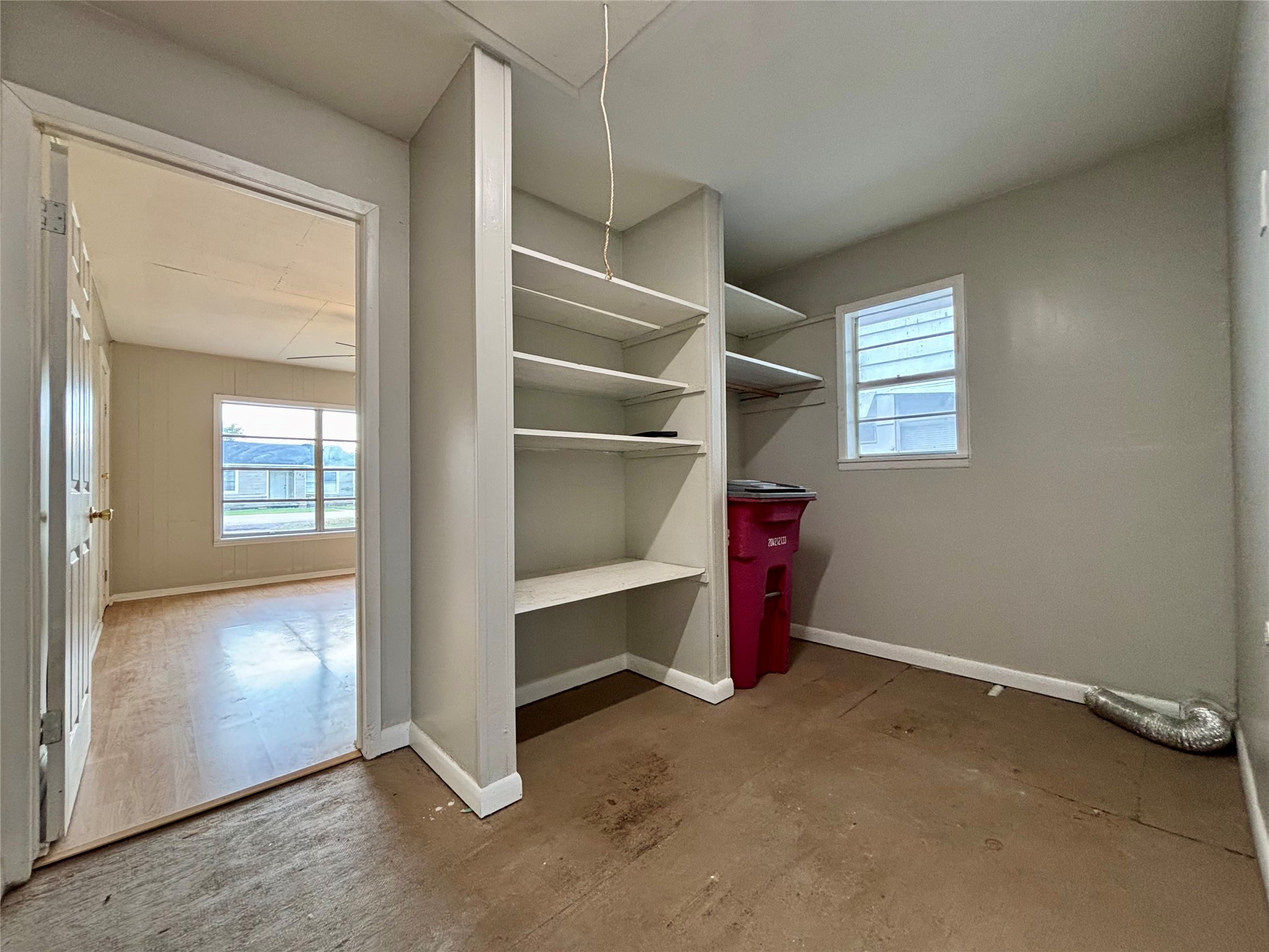 706 West 7th Street Freeport, TX 77541 - Photo 18 of 22 a view of an empty room with cabinet and a window