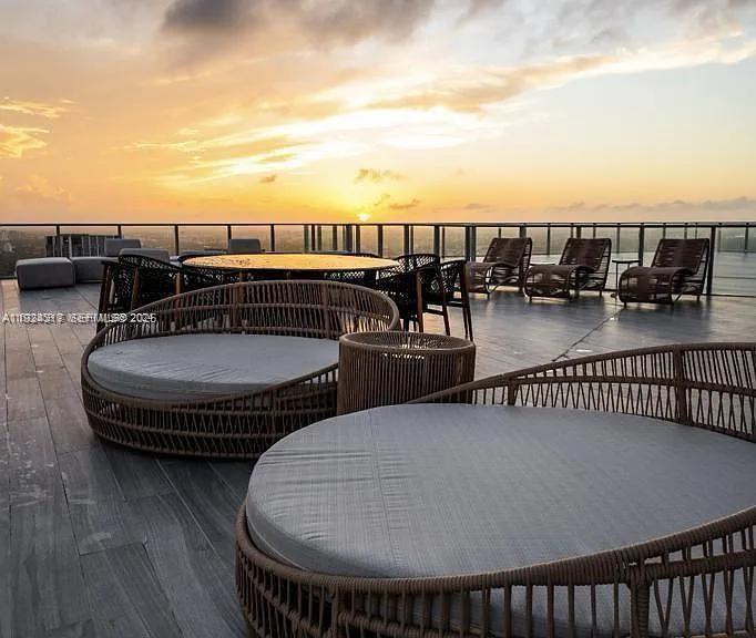 851 Northeast 1st Avenue, Unit 4811 Miami, FL 33132 - Photo 17 of 30 a terrace with outdoor seating and city view