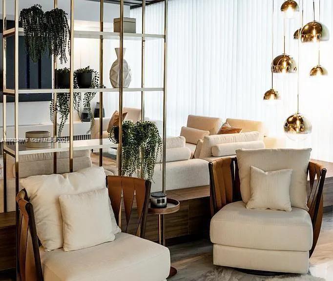 851 Northeast 1st Avenue, Unit 4811 Miami, FL 33132 - Photo 6 of 30 a living room with furniture and a floor to ceiling window