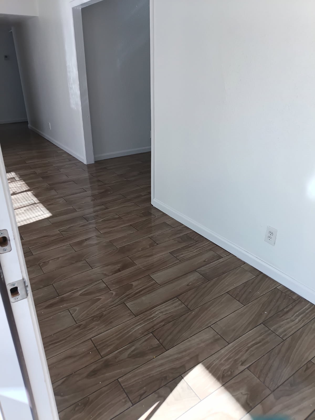 6200 West Tidwell Road, Unit 2306 Houston, TX 77092 - Photo 15 of 15 a view of hallway with wooden floor