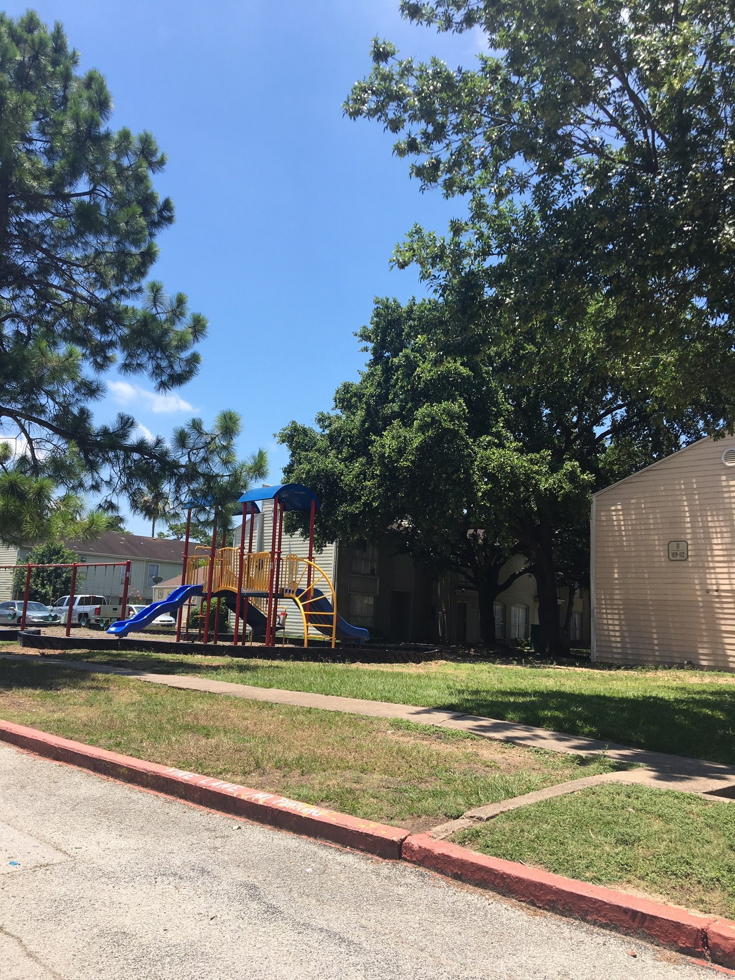 6200 West Tidwell Road, Unit 2306 Houston, TX 77092 - Photo 3 of 15 a view of swimming pool with outdoor seating and large trees