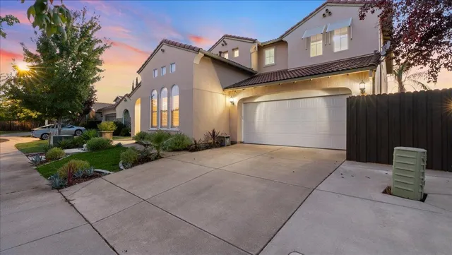 a view of a building with a yard