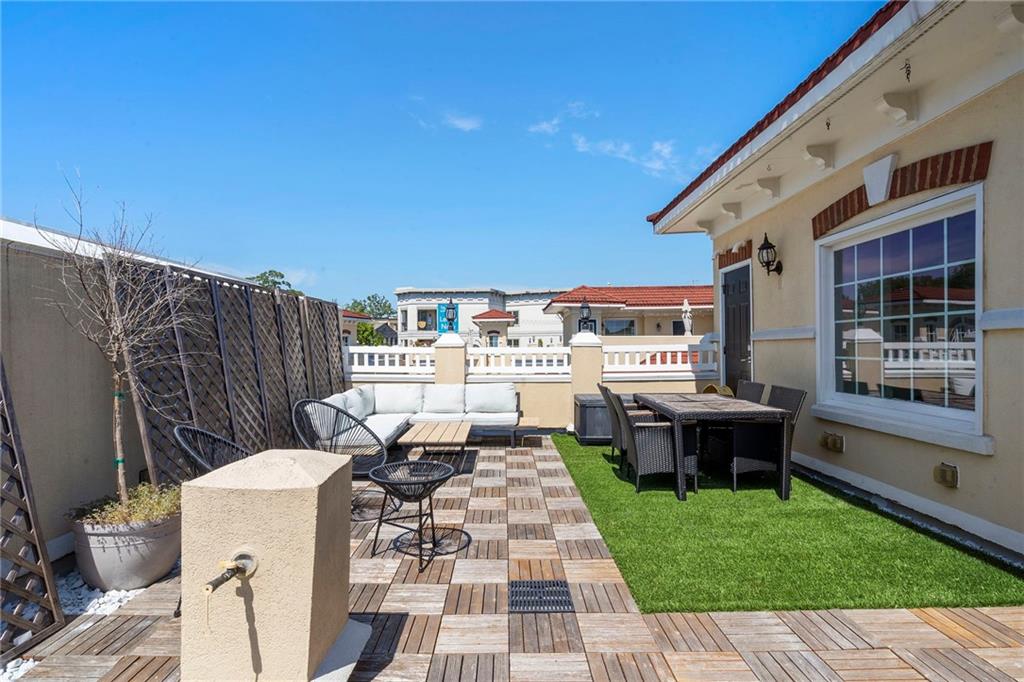 3541 Roswell Road Northeast, Unit 4 Atlanta, GA 30305 - Photo 42 of 45 a view of a patio with table and chairs