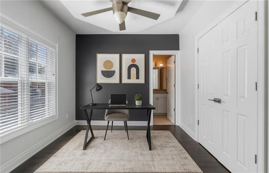 3541 Roswell Road Northeast, Unit 4 Atlanta, GA 30305 - Photo 8 of 45 a view of a workspace with furniture and a window