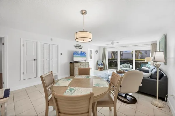a view of a livingroom with furniture and window