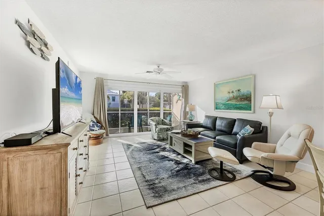 a kitchen with stainless steel appliances granite countertop a sink a stove and a microwave