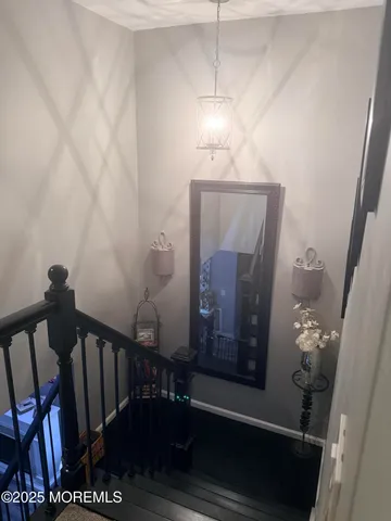 a kitchen with a table and chairs