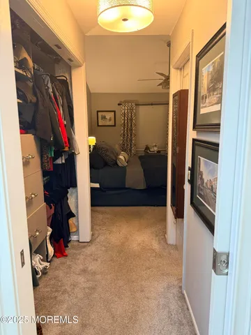 a view of wooden floor and windows in a room