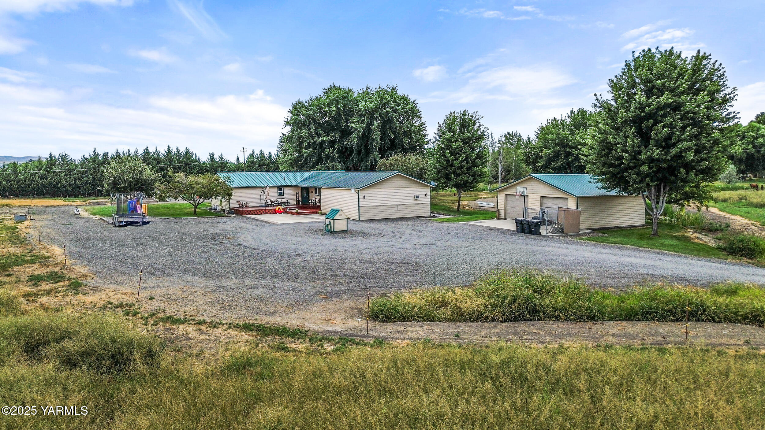 2715 Riverside Road Yakima, WA 98901 - Photo 3 of 35 a view of house with backyard and entertaining space