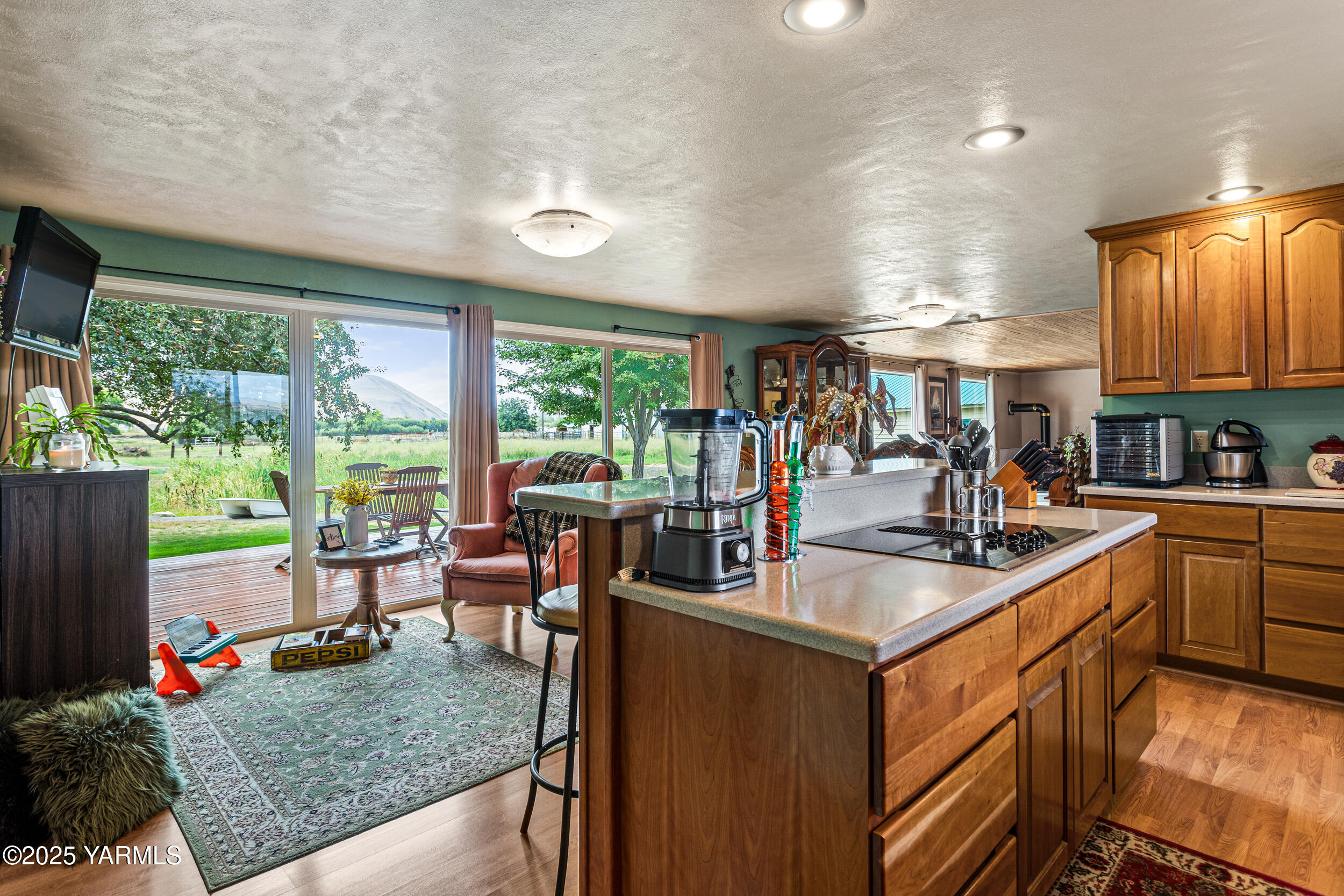 2715 Riverside Road Yakima, WA 98901 - Photo 10 of 35 a kitchen with sink a stove and cabinets