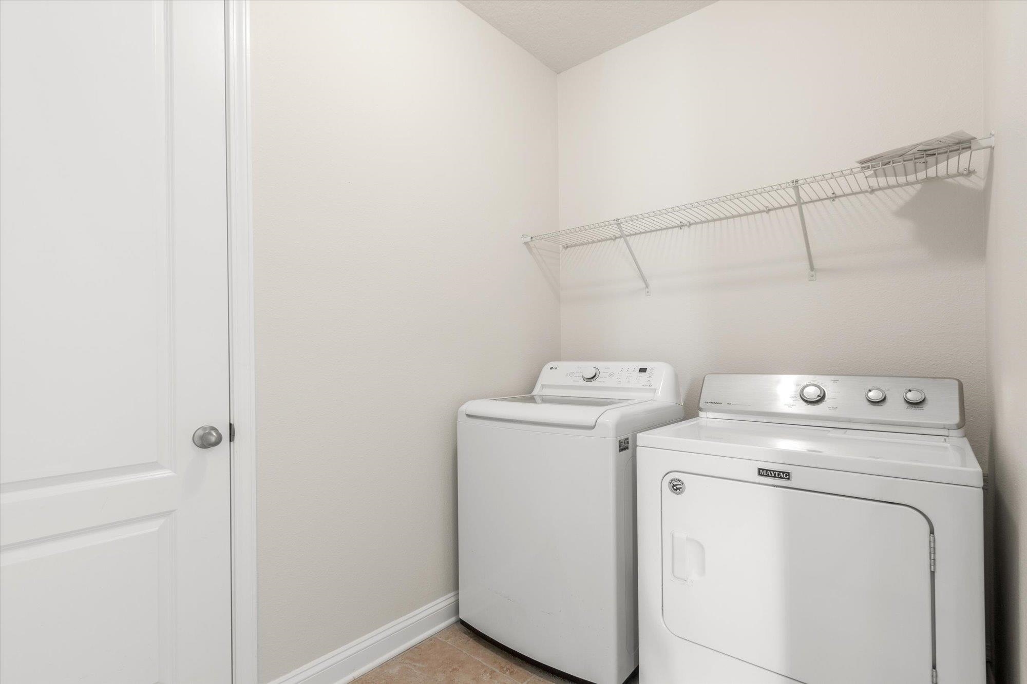 70 Quartz Place St. Augustine, FL 32086 - Photo 23 of 78 a utility room with dryer and washer