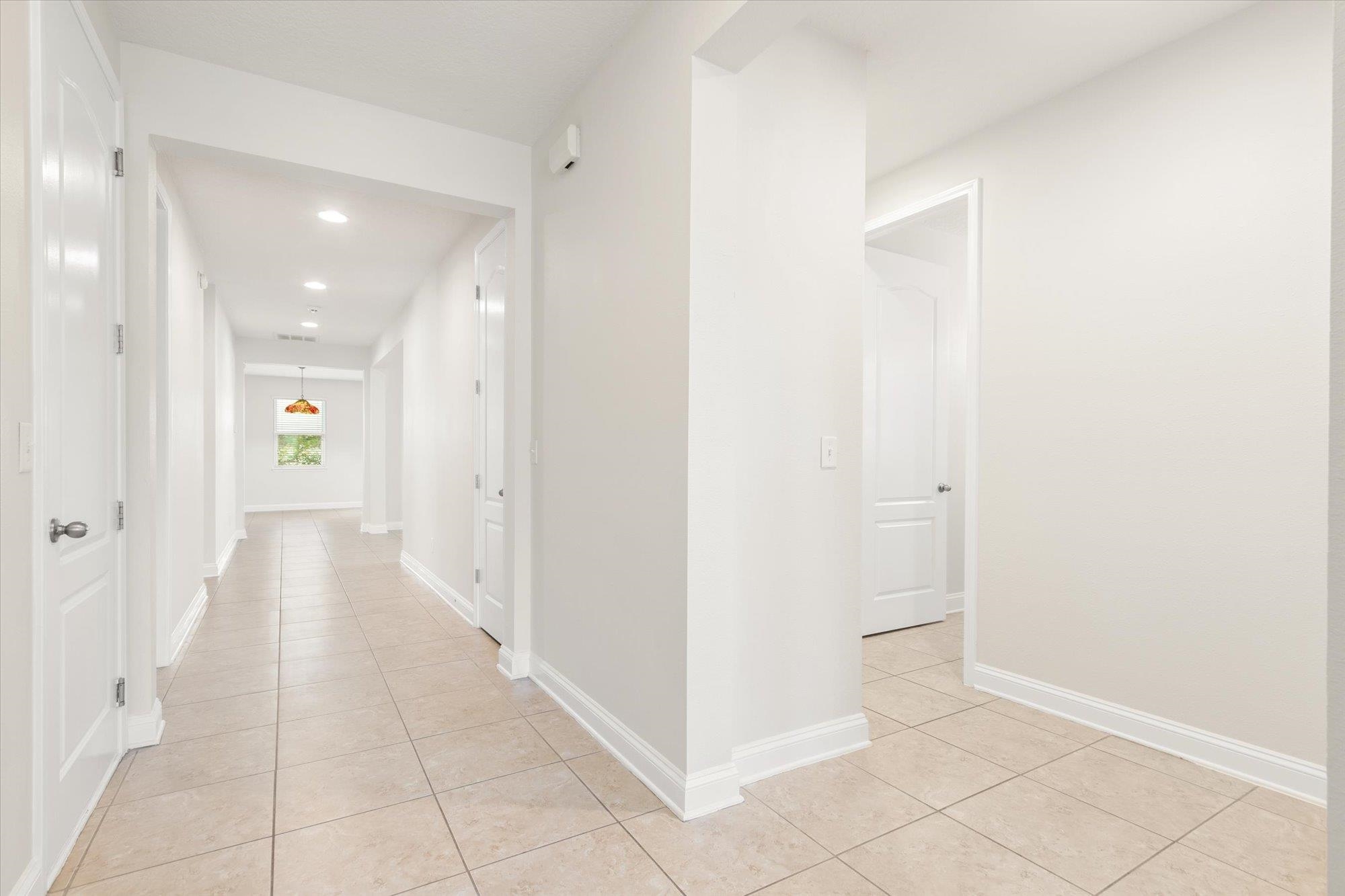 70 Quartz Place St. Augustine, FL 32086 - Photo 30 of 78 a view of a hallway with wooden shelves