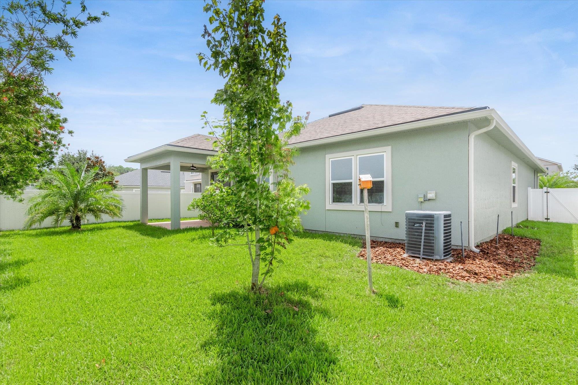 70 Quartz Place St. Augustine, FL 32086 - Photo 39 of 78 a front view of house with a garden